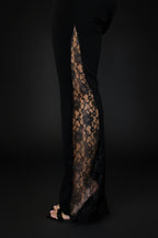 Black lace pants on a white background